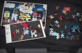 Puzzle pieces are laid out on a desk, showing glimpses of Doctor Fissionton.[11]